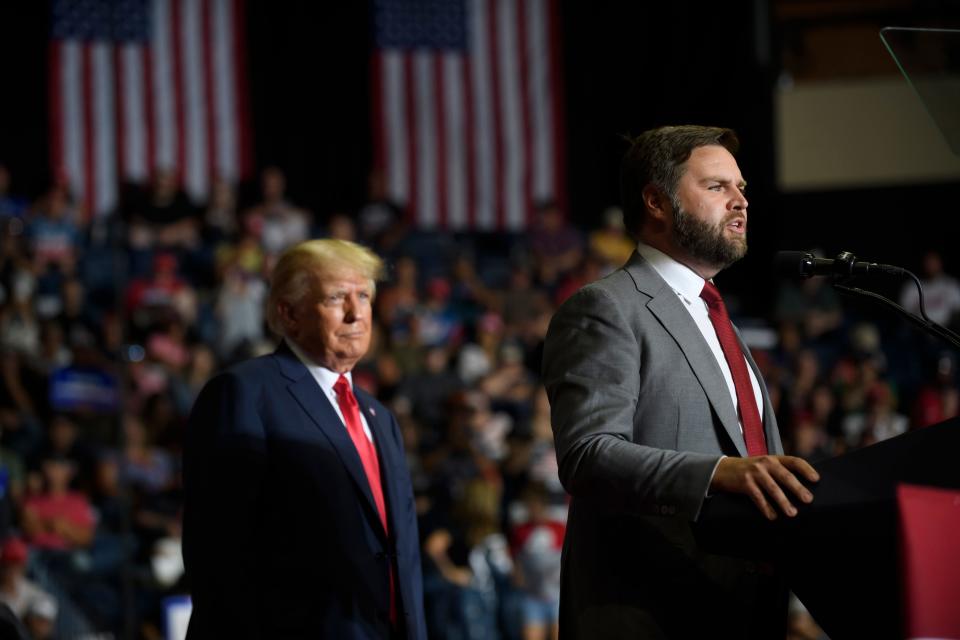 Republican Senate candidate JD Vance and former President Donald Trump speak at a Save America Rally to support Republican candidates running for state and federal offices in the state at the Covelli Centre during on September 17, 2022 in Youngstown, Ohio.