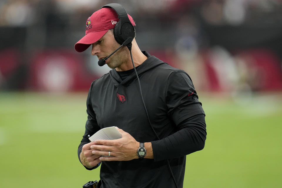 Arizona Cardinals head coach Jonathan Gannon looks away during the first half of an NFL football game against the Cincinnati Bengals, Sunday, Oct. 8, 2023, in Glendale, Ariz. (AP Photo/Ross D. Franklin)