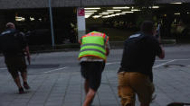 <p>In this frame grab taken from video, people run from the Olympia Einkaufszentrum shopping center after a shooting, in Munich, Germany, Friday, July 22, 2016.(Thamina Stoll/UGC via AP)</p>