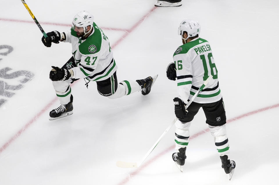 Dallas Stars' Alexander Radulov (47) and Joe Pavelski (16) celebrate Radulov's goal against the Colorado Avalanche during first-period NHL Western Conference Stanley Cup playoff game action in Edmonton, Alberta, Friday, Sept. 4, 2020. (Jason Franson/The Canadian Press via AP)