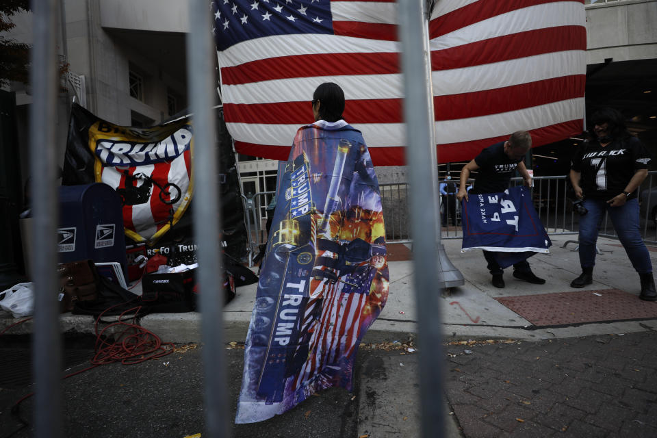 Supporters of President Donald Trump protest outside the Pennsylvania Convention Center, where vote counting continues, in Philadelphia, Monday, Nov. 9, 2020, two days after the 2020 election was called for Democrat Joe Biden. (AP Photo/Rebecca Blackwell)