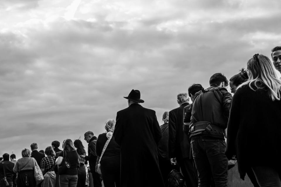 Members of the public wait in queue and make their way along the Thames River to view Queen Elizabeth II lying-in-state