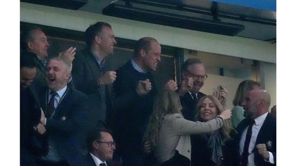 Prince William and football fans celebrating
