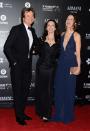 DUBAI, UNITED ARAB EMIRATES - DECEMBER 14: Actor Colin Firth, actress Kirstin Davis and Livia Firth attend the 2012 Dubai International Film Festival, Dubai Cares and Oxfam "One Night to Change Lives" Charity Gala at the Armani Hotel on December 14, 2012 in Dubai, United Arab Emirates. (Photo by Andrew H. Walker/Getty Images for DIFF)