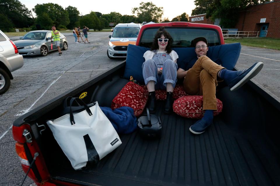 Moviegoers settle in at the opening night of Ciné’s drive-in movie theater in Athens, Ga., on Tuesday, June 1, 2021. The theater showed “Mad Max: Fury Road” to start out its summer drive-in movie theater shows with a sold-out parking lot at the General Time/Westclox clock factory on Newton Bridge Road.