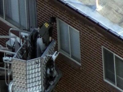 Raw Video: FBI search alleged gunman's apartment