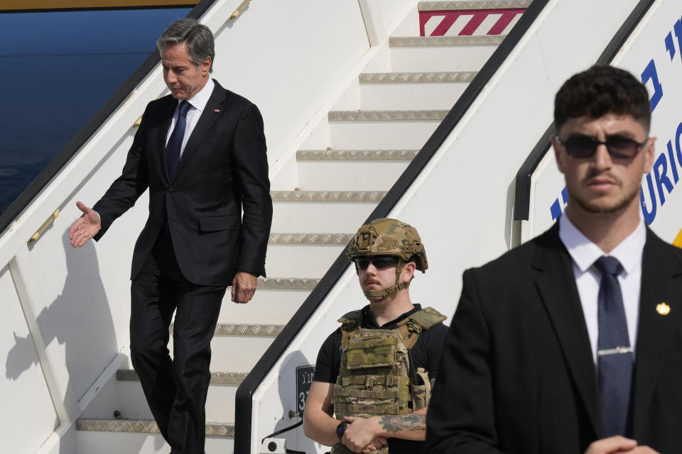 FILE - Secretary of State Antony Blinken arrives at Ben Gurion Airport in Tel Aviv, Israel, Oct. 12, 2023. AP Washington photographer Jacquelyn Martin recalls how being one of a few female photographers covering news and politics was useful when she was assigned as the press pooler for Blinken's last-minute trip to Israel and the Middle East in the aftermath of the Hamas attacks. Martin said, “Sometimes people not knowing what to make of you works in your favor.” (AP Photo/Jacquelyn Martin, Pool, File)