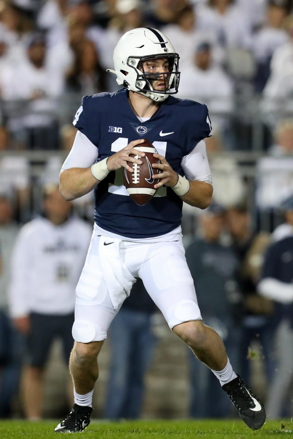 Oct 2, 2021; University Park, Pennsylvania, USA; Penn State Nittany Lions quarterback Sean Clifford (14) drops back in the pocket against the Indiana Hoosiers during the first quarter at Beaver Stadium. Mandatory Credit: Matthew OHaren-USA TODAY Sports