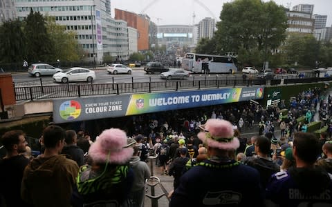 London NFL fans are converging on Wembley eager to see the Oakland Raiders vs Seattle Seahawks - Credit: AP Photo/Tim Ireland