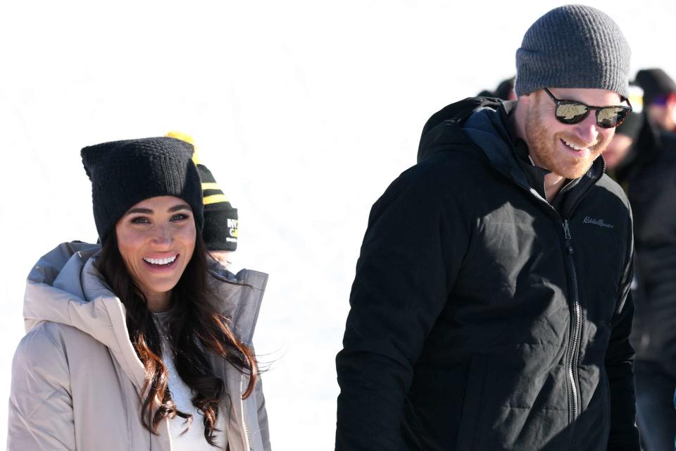 <p>Karwai Tang/WireImage</p> Meghan Markle and Prince Harry attend the Invictus Games Winter Training Camp in Canada on Feb. 14, 2024