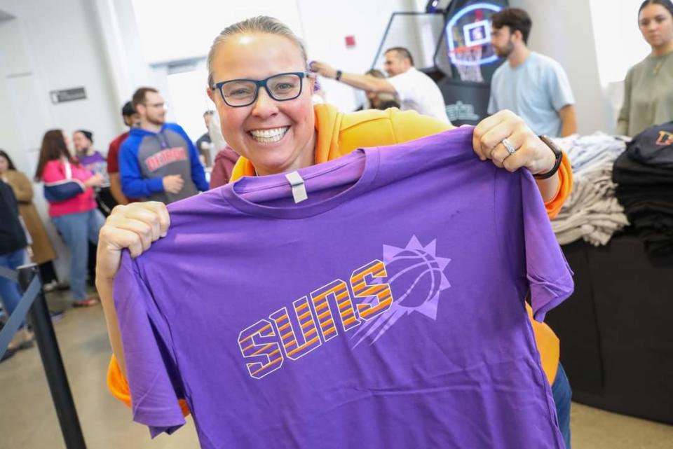 United Wholesale Mortgage team members picked out Phoenix Suns t-shirts to wear days before the Suns visited the campus on Oct. 9, 2023, in Pontiac, Michigan.