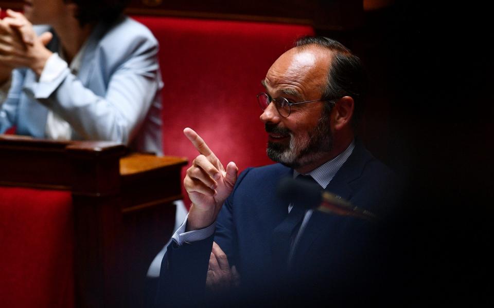 French Prime Minister Edouard Philippe gestures during a session of questions to the government at the French National Assembly in Paris - Reuters