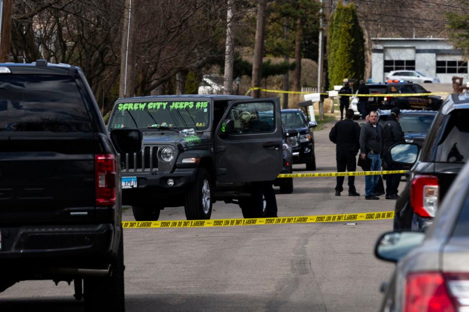 Police search a vehicle involved in a violent attack Wednesday, March 27, 2024, in the 2100 block of Eggleston Road in Rockford.