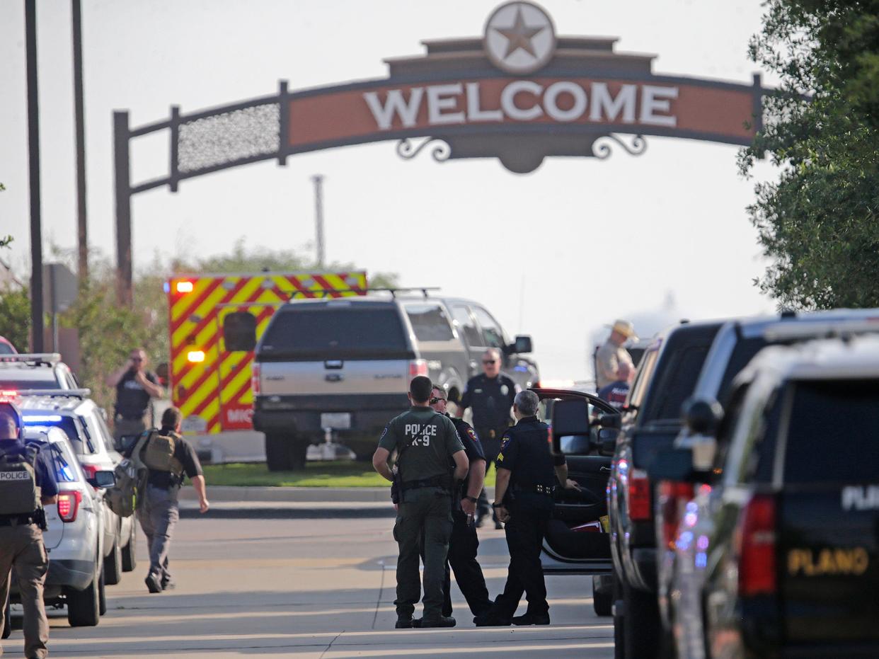 Emergency personnel work the scene of a shooting at Allen Premium Outlets on May 6, 2023 in Allen, Texas.