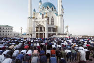 Muslims take part in Eid al Fitr prayers at the Kul Sharif Mosque in Kazan, Russia, Thursday, May 13, 2021. (AP Photo/Dmitri Lovetsky)