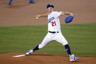 Los Angeles Dodgers starter Walker Buehler winds up during the first inning of the team's baseball game against the Oakland Athletics on Thursday, Sept. 24, 2020, in Los Angeles. (AP Photo/Marcio Jose Sanchez)