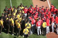 <p>Pittsburgh Pirates and Washington Nationals players mingle during a third inning skirmish at PNC Park. Mandatory Credit: Charles LeClaire-USA TODAY Sports </p>