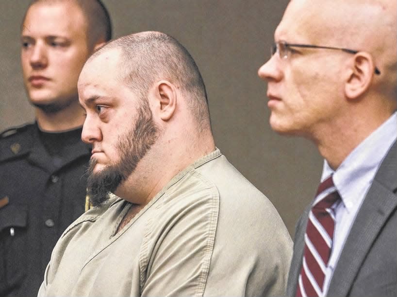 Gary Wilson (center) stands before state Superior Court Judge John Pursel on Tuesday, July 23, 2013, in Somerville. Wilson was ordered to serve 45 years in prison for the murder of Bridgewater resident Carolyn Stone in 2009; at right is his attorney Chris Kazlau.