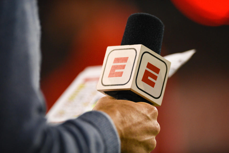 CINCINNATI, OH - OCTOBER 04: ESPN sideline reporter Paul Carcaterra holding a mic during a college football game between the University of Central Florida Knights (UCF) and Cincinnati Bearcats on October 4, 2019 at Nippert Stadium in Cincinnati, OH  (Photo by James Black/Icon Sportswire via Getty Images)