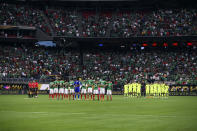 <p>Mexico and Venezuela players pause for a moment of silence in honor of victims of the Orlando mass shooting before a match during the group play stage of the 2016 Copa America Centenario at NRG Stadium on June 13, 2016 in Houston, Texas. ( Photo: Troy Taormina/USA TODAY Sports/Reuters) </p>