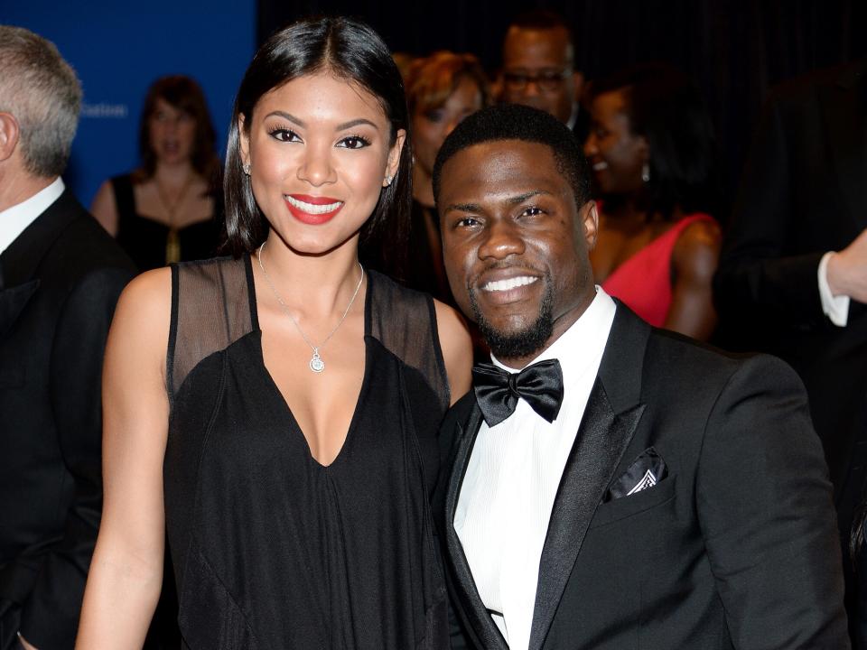 Kevin Hart (R) and Eniko Parrish attends the 100th Annual White House Correspondents' Association Dinner at the Washington Hilton on May 3, 2014 in Washington, DC