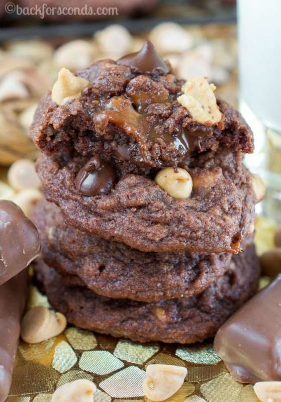 <p>Back for Seconds</p><p>These soft and chewy Chocolate Peanut Butter Twix Cookies are sure to become a new favorite treat in your house! What more could you want in a cookie?</p><p><strong>Get the recipe: </strong><strong><a href="https://backforseconds.com/chocolate-peanut-butter-twix-cookies/" rel="nofollow noopener" target="_blank" data-ylk="slk:Chocolate Peanut Butter Twix Cookies;elm:context_link;itc:0;sec:content-canvas" class="link ">Chocolate Peanut Butter Twix Cookies</a></strong></p><p><strong>Related: </strong><strong><a href="https://parade.com/329010/parade/make-your-own-twix-bars/" rel="nofollow noopener" target="_blank" data-ylk="slk:Make Your Own Twix Bars;elm:context_link;itc:0;sec:content-canvas" class="link ">Make Your Own Twix Bars</a></strong></p>