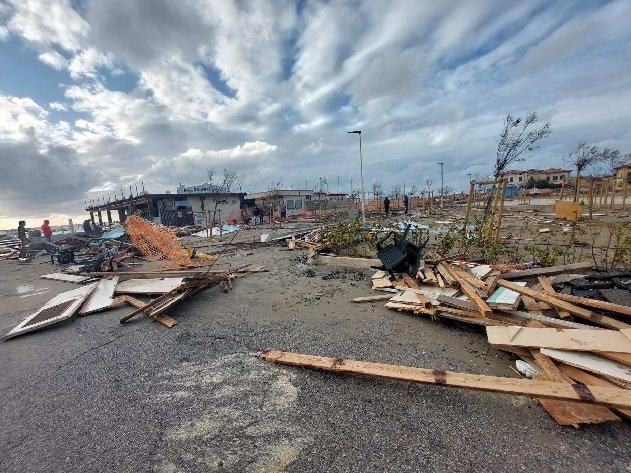 The seafront in Marina di Pisa covered in debris following Storm Ciaran 