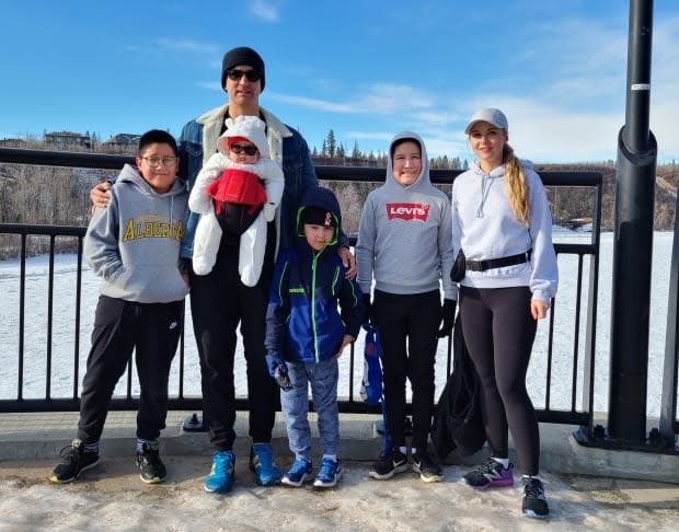 University of Alberta PhD student Grant Bruno, seen here with his family, is studying autism in First Nations communities. (Submitted by Grant Bruno - image credit)