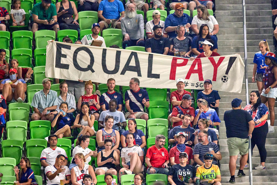 AUSTIN, TX - JUNE 16: United States fans hold up an Equal Pay banner in protest of unequal wages for female athletes in action during a Summer Series friendly international match between Nigeria and the United States on June 16, 2021 at Q2 Stadium in Austin, TX. (Photo by Robin Alam/Icon Sportswire via Getty Images)