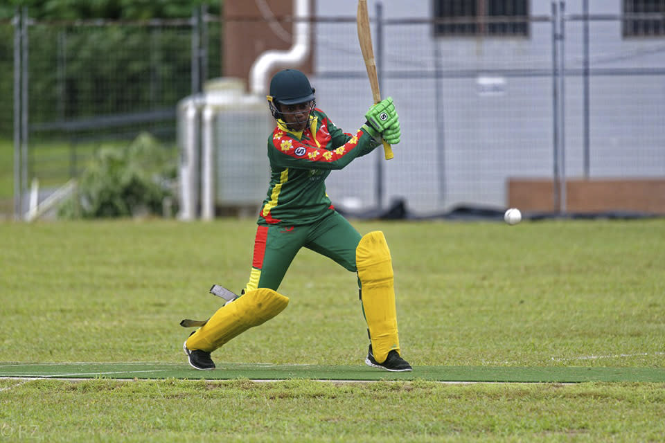 In this May, 2019, photo provided by the Vanuatu Cricket Association Valenta Langiatu bats during a women's cricket match in Port Vila, Vanuatu. The tropical island in the South Pacific is very likely to be the only venue in the world hosting a competitive cricket final on Saturday, as most international sport remains shuttered around the globe. (Ron Zwiers/Vanuatu Cricket Association via AP)