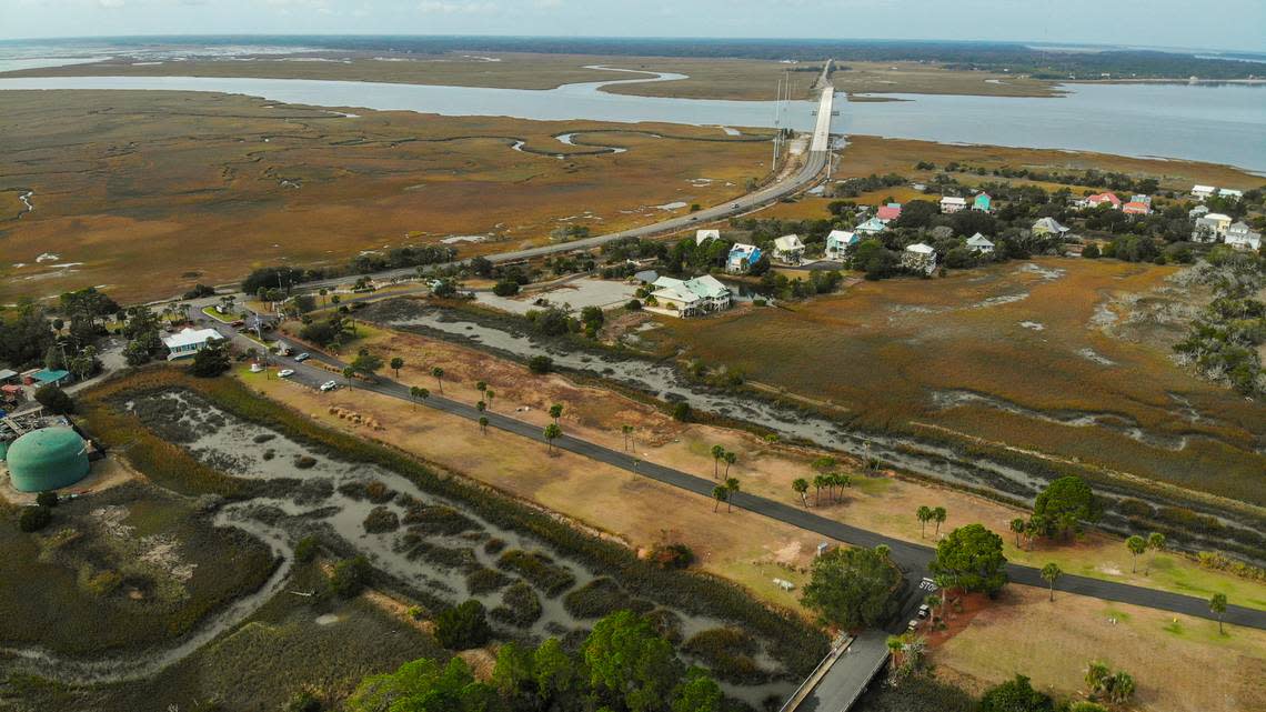 The entrance to the gated, private community of Harbor Island, a barrier island bounded by the Harbor River, top and Hunting Island (not pictured) to the west as photographed on Dec. 6, 2022.