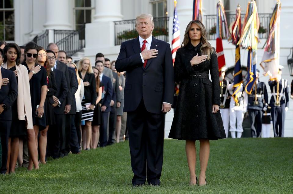 <p>Melania led a moment of silence with President Trump to commemorate the lives lost during the 2001 terrorist attacks. For the service, FLOTUS wore a black, belted jacquard coat with black heels to match-fitting for the somber occasion.</p>