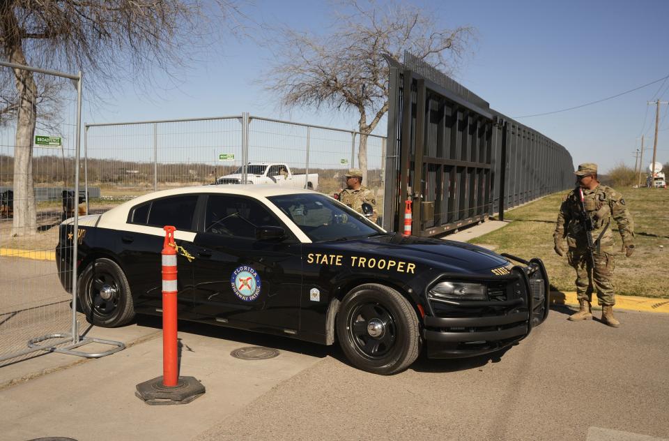 A Florida state trooper leaves Shelby Park in Eagle Pass, Texas.
