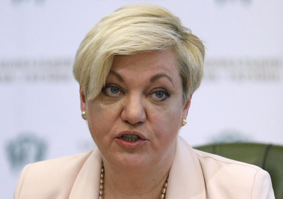 FILE - In this Monday, April 10, 2017 file photo, the chief of the Ukrainian Central Bank Valeria Gontareva makes a statement on her resignation during a press conference in Kyiv, Ukraine. Ukrainian officials on Monday Oct. 21, 2019, lashed out at a parody song targeting Ukraine's former central bank chief Gontareva, and mocking an arson attack on her home which was firebombed last month. (AP Photo/Sergei Chuzavkov, File)