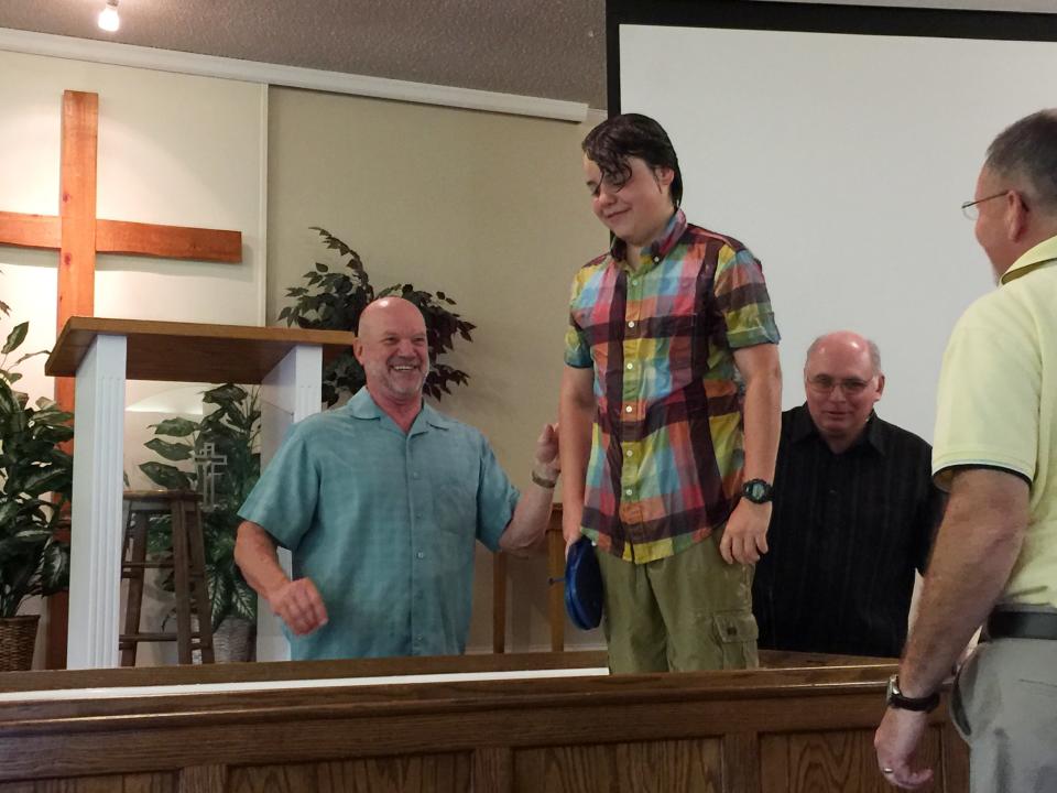 Donald Foose, left, joined Oakwood Baptist Church as a member in 2001 and became a pastor there in 2006. He is pictured here baptizing Aaron Benninger in July 2016.
