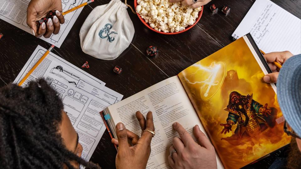 Dungeons and Dragons book and players