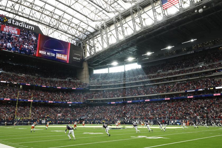 FILE - The opening kickoff in a general stadium view during an NFL wild-card playoff football game, Jan. 13, 2024, in Houston. The NFL competition committee is proposing a rule to penalize so-called "hip-drop" tackles and a radical change to kickoffs to add more returns without compromising safety. (AP Photo/Matt Patterson, File)