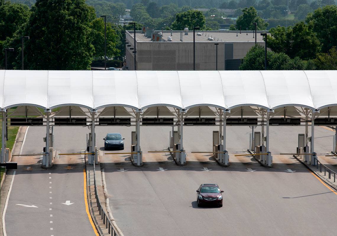 Cars enter a parking area at Raleigh-Durham International Airport on Monday, May 22, 2023.