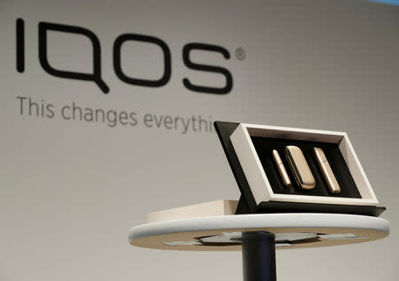 FILE PHOTO: Philip Morris new IQOS 3 devices are displayed during a news conference by its International's CEO Andre Calantzopoulos in Tokyo, Japan, October 23, 2018. REUTERS/Kim Kyung-Hoon/File Photo