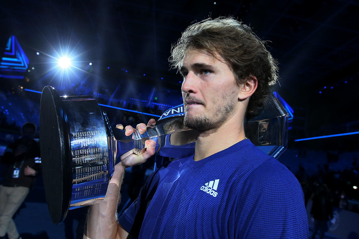 TURIN, ITALY - NOVEMBER 21: Alexander Zverev of Germany holds the trophy after winning the Men's Single's Final between Alexander Zverev of Germany and Daniil Medvedev of Russia during Day Eight of the Nitto ATP World Tour Finals at Pala Alpitour on November 21, 2021 in Turin, Italy. (Photo by Giampiero Sposito/Getty Images)