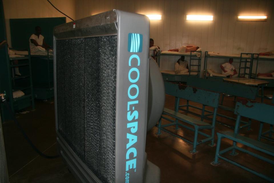 A cooling fan at the Texas Department of Criminal Justice Holliday Unit near Huntsville, Texas, June 20, 2014. <a href="https://newsroom.ap.org/detail/TexasPrisonsHeat/776133c6f300470696221bdd4767fe30/photo" rel="nofollow noopener" target="_blank" data-ylk="slk:AP Photo/Michael Graczyk;elm:context_link;itc:0;sec:content-canvas" class="link ">AP Photo/Michael Graczyk</a>