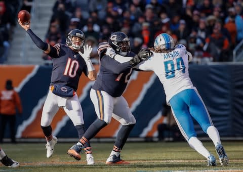 Chicago Bears quarterback Mitchell Trubisky (10) looks to pass the ball against the Detroit Lions during the second half at Soldier Field - Credit: Kamil Krzaczynski/USA Today