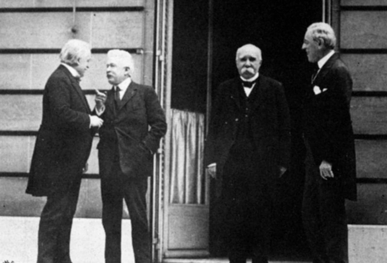 <span class="caption">On May 27, 1919, British Prime Minister Lloyd George, Italian President Vittorio Orlando, French Prime Minister Georges Clemenceau and American President Woodrow Wilson met May 27, 1919, during the Paris Peace Conference.</span> <span class="attribution"><a class="link " href="https://www.gettyimages.com/detail/news-photo/british-prime-minister-lloyd-george-italian-president-news-photo/3289187?adppopup=true" rel="nofollow noopener" target="_blank" data-ylk="slk:Lee Jackson/Topical Press Agency/Getty Images);elm:context_link;itc:0;sec:content-canvas">Lee Jackson/Topical Press Agency/Getty Images)</a></span>