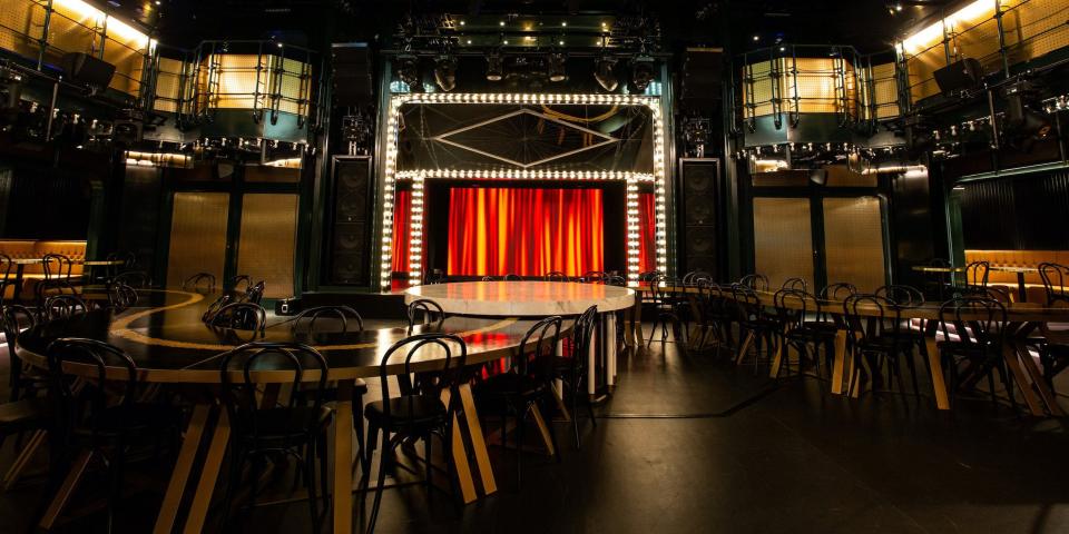 tables in front of a stage