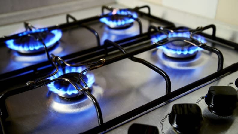 Credit:                      Getty Images / Gangis_Khan                                             If your gas stove is emitting orange color flames, this can be a sign of elevated CO levels, so get it checked out by a pro.