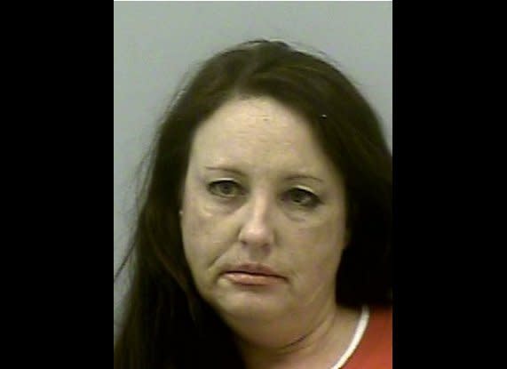 Jana Lawrence, 46, of Dacula, Ga., is accused of wreaking havoc at two restaurants Saturday, by groping, licking and flashing fellow patrons before being arrested.