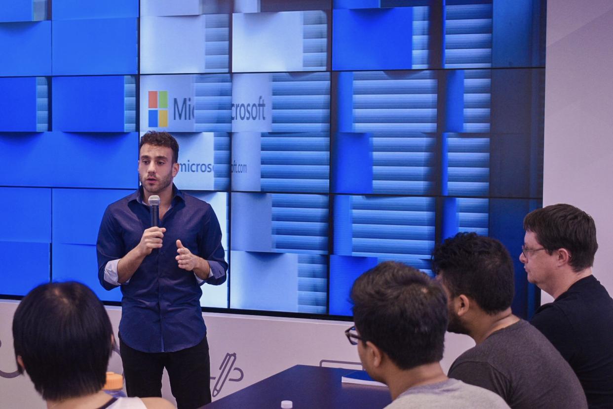 Michael Peres speaking at the Microsoft Store University Village