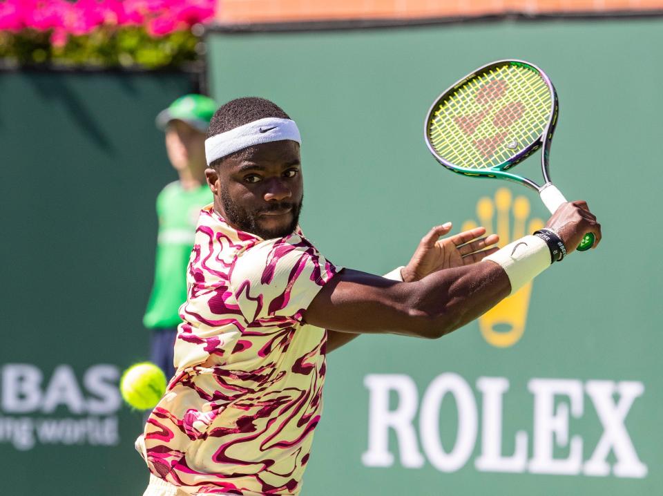 Frances Tiafoe of the United States hits to Daniil Medvedev of Russia during their semifinal match at the BNP Paribas Open at the Indian Wells Tennis Garden in Indian Wells, Calif., Saturday, March 18, 2023.