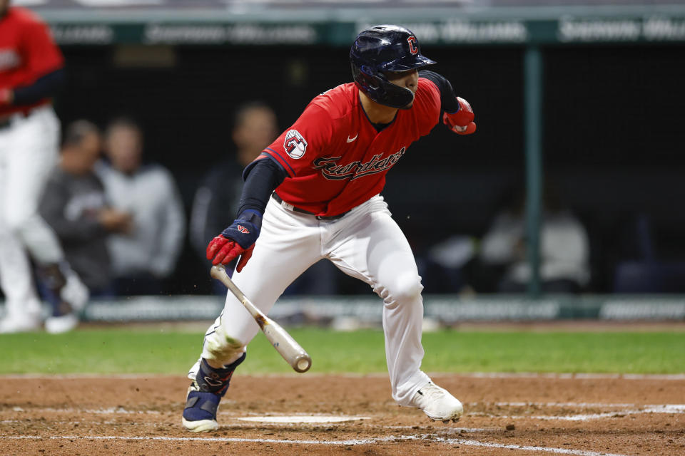 Cleveland Guardians' Andres Gimenez watches his RBI single off Kansas City Royals starting pitcher Daniel Lynch during the fifth inning of a baseball game, Tuesday, Oct. 4, 2022, in Cleveland. (AP Photo/Ron Schwane)