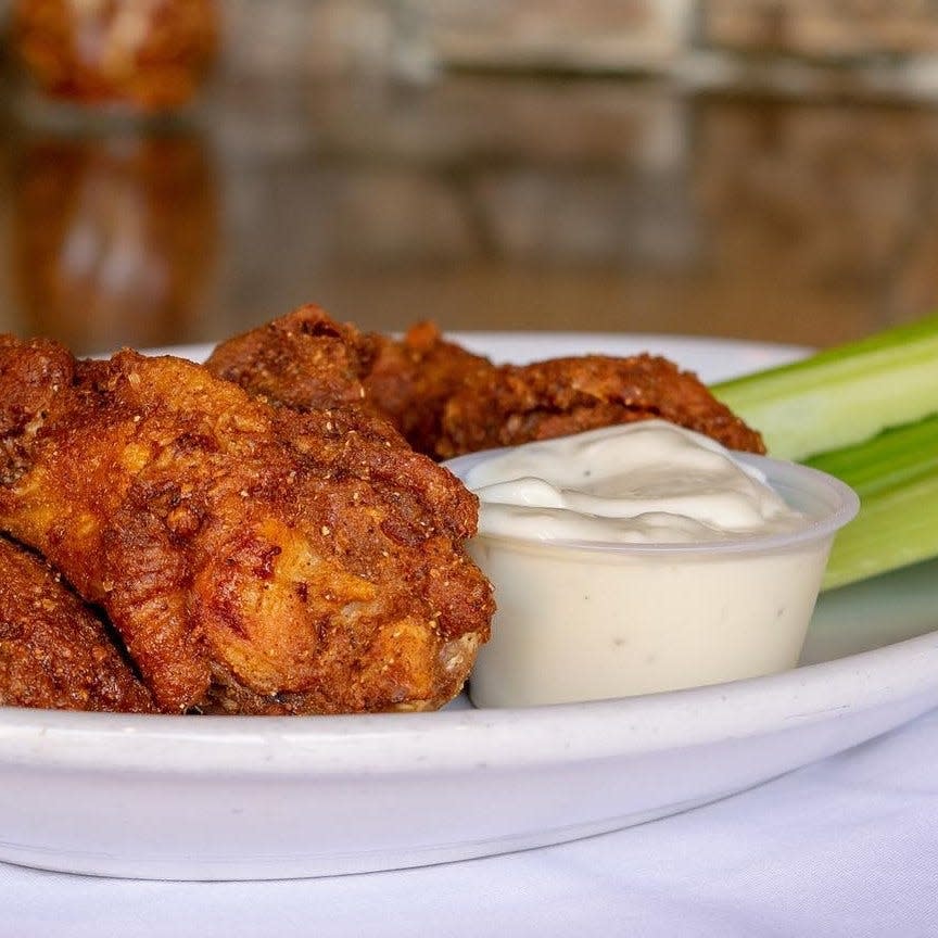 The Nashville Hot Rub Breaded Wings from OH Pizza and Brew get their kick from cayenne and their sweetness from brown sugar.